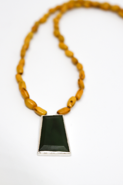 Pendant (Sterling Silver, Stone, Glass, Kōwhai Seed, Tigers Tail)