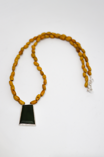 Pendant (Sterling Silver, Stone, Glass, Kōwhai Seed, Tigers Tail)